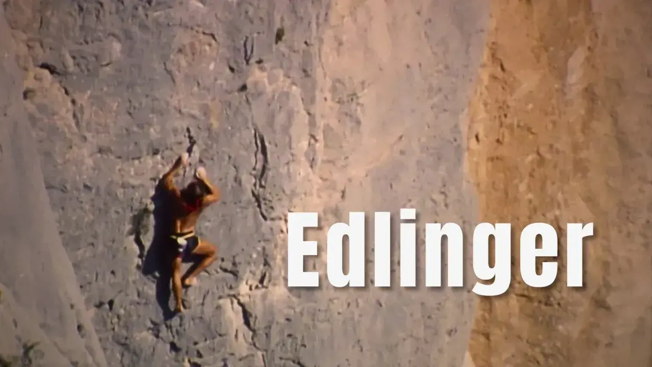 Patrick Edlinger, icône de l'escalade, en pleine ascension. Une image qui évoque la force et la passion, comme celles de sa famille.